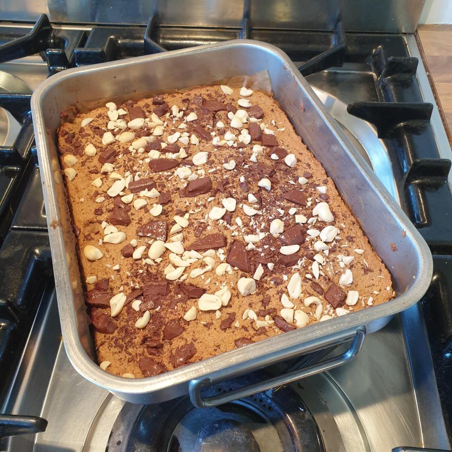 The tray of chickpea blondies on the hob just after they have come out the oven.